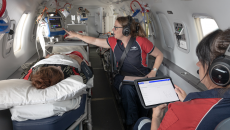 RFDS crews with an emergency patient on an aeromedical flight